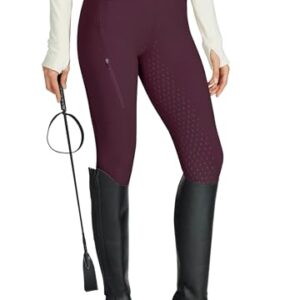 Dame in einer Reithose mit Silikon-Vollsitz, elastischem Material und Reißverschlusstasche, ideal für Reiten