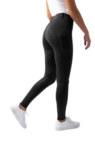 Dame in schwarzer Reitlegging mit Handytaschen und Gürtelschlaufen beim Gehen, HORZE Damen Reitleggings DEA