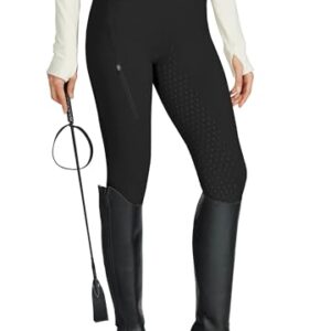 Dame in einer WILLIT Reitlegging Damen Reithose, Silikon Vollbesatz, High Waist Stretch Reithose mit Reißverschlusstasche und Gürtelschlaufen, Schwarz, Größe XL
